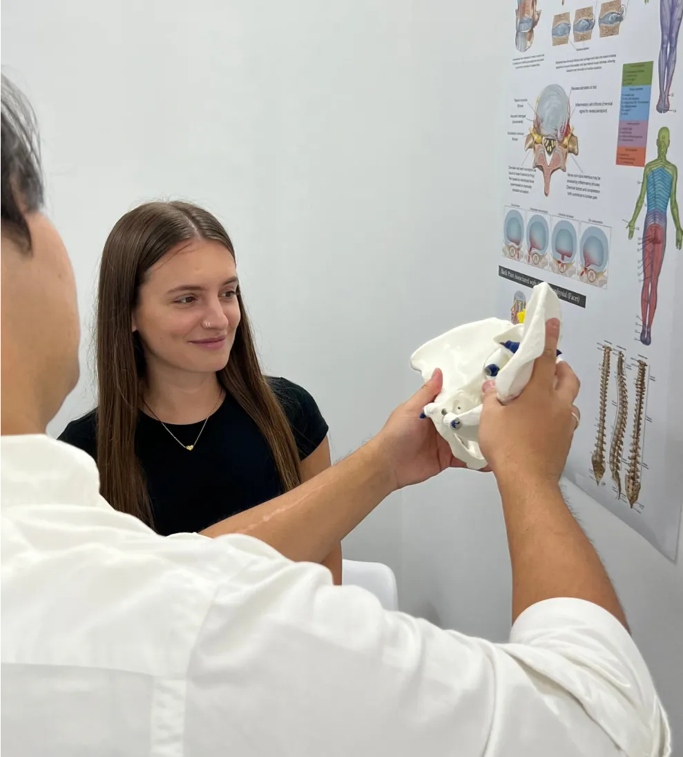 Practitioner treating a patient’s elbow