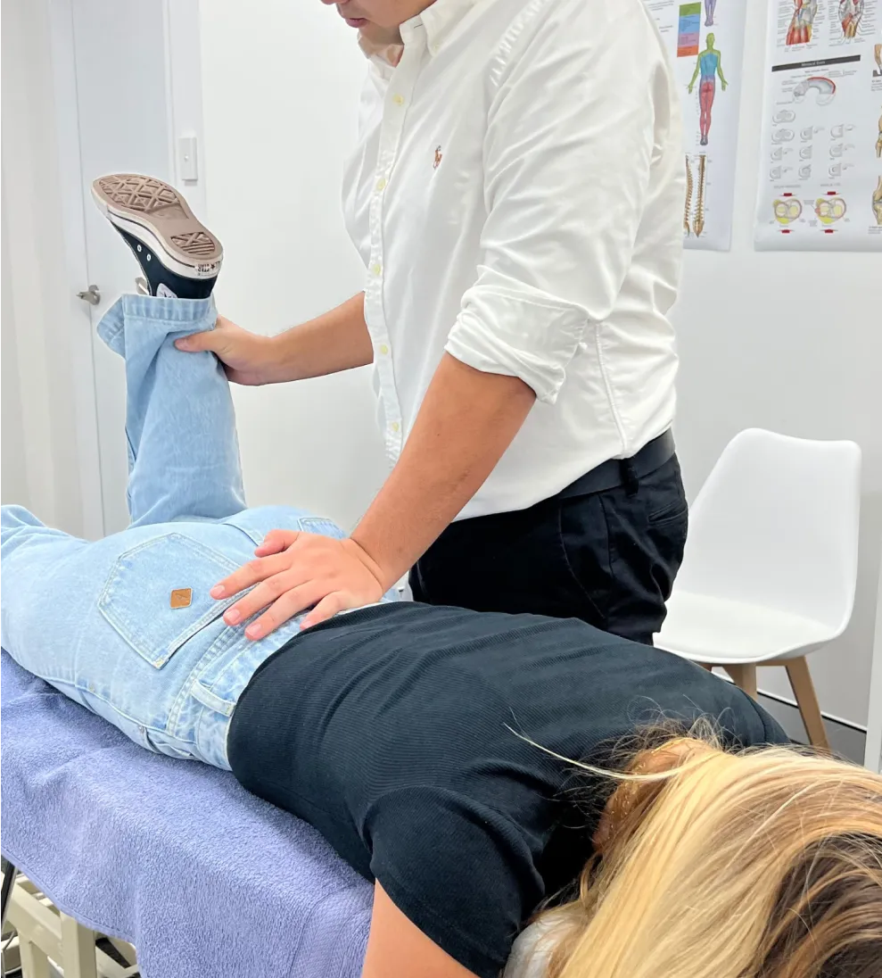 Practitioner treating a patient’s ankle