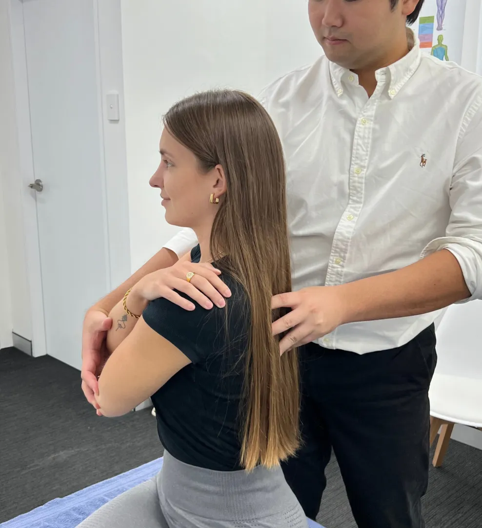 Practitioner assessing a patient’s pelvis