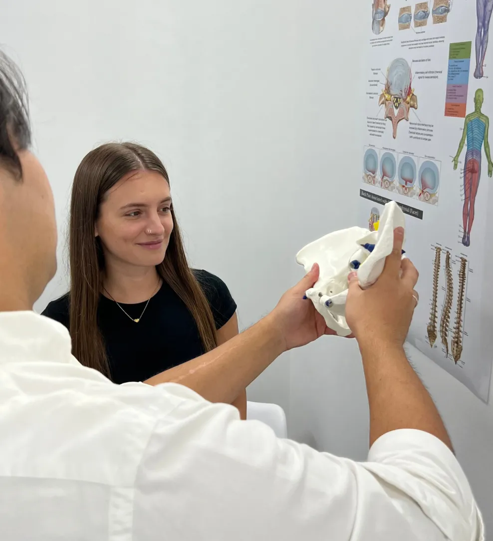 Practitioner treating a patient’s knee